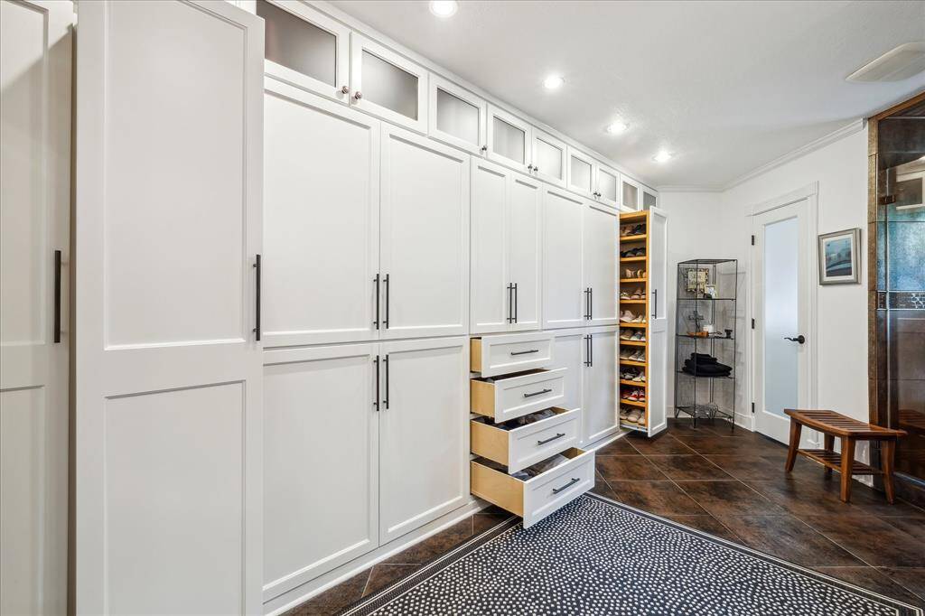 A view of the custom built in closets.