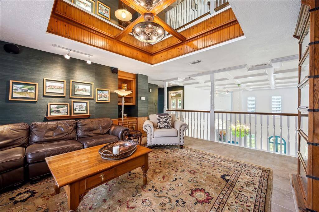 Another view of the den that overlooks the family room downstairs.