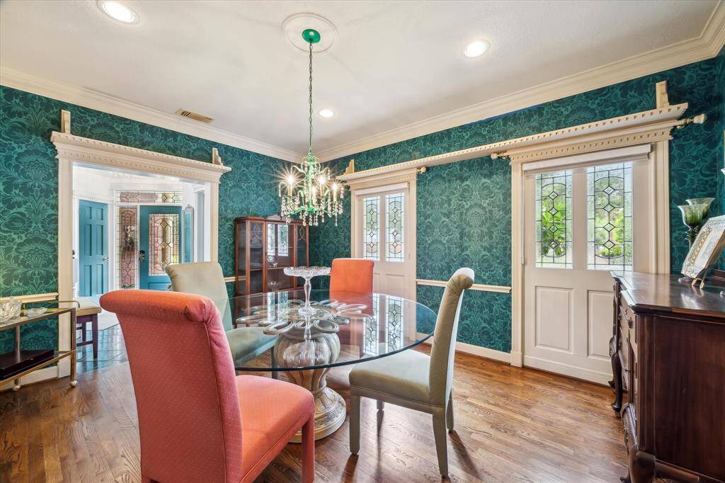 Formal dining room with beautiful molding and charm.