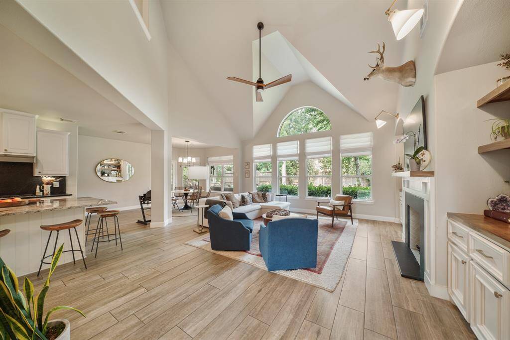 The living spaces on the back of the house are open to each other for ease of entertaining
