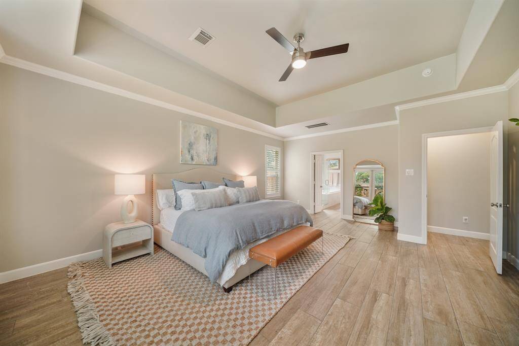 This Primary Suite has plenty of space for a sitting area or office, too