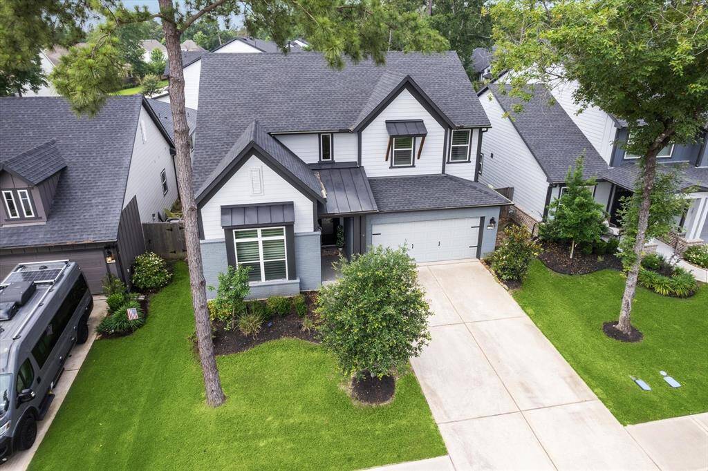 Welcome home to 213 Thistle Drive, where timeless elegance blends seamlessly with modern comfort in Woodforest—a premier master-planned community in Montgomery. Experience the perfect balance of charm and convenience in this exceptional neighborhood, designed for a life well-lived.