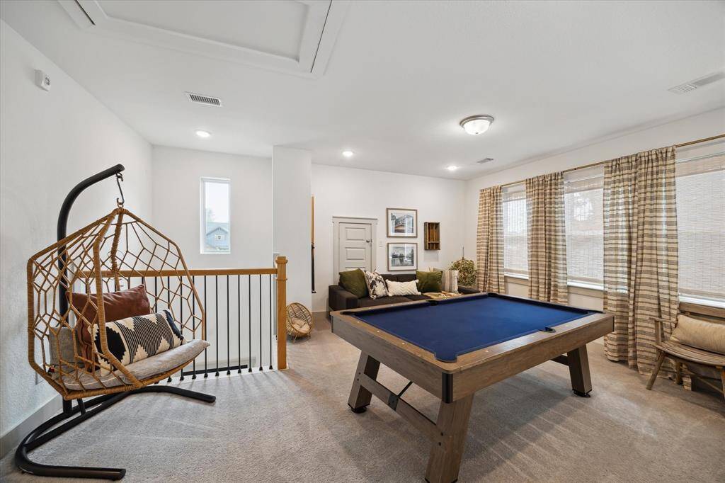 This spacious loft offers endless potential: game room, lounge, or your favorite hangout spot.