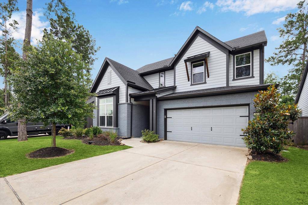 Impressive front facade highlighting exquisite details, contemporary style, and a beautifully landscaped garden, and waiting for you to call it home.