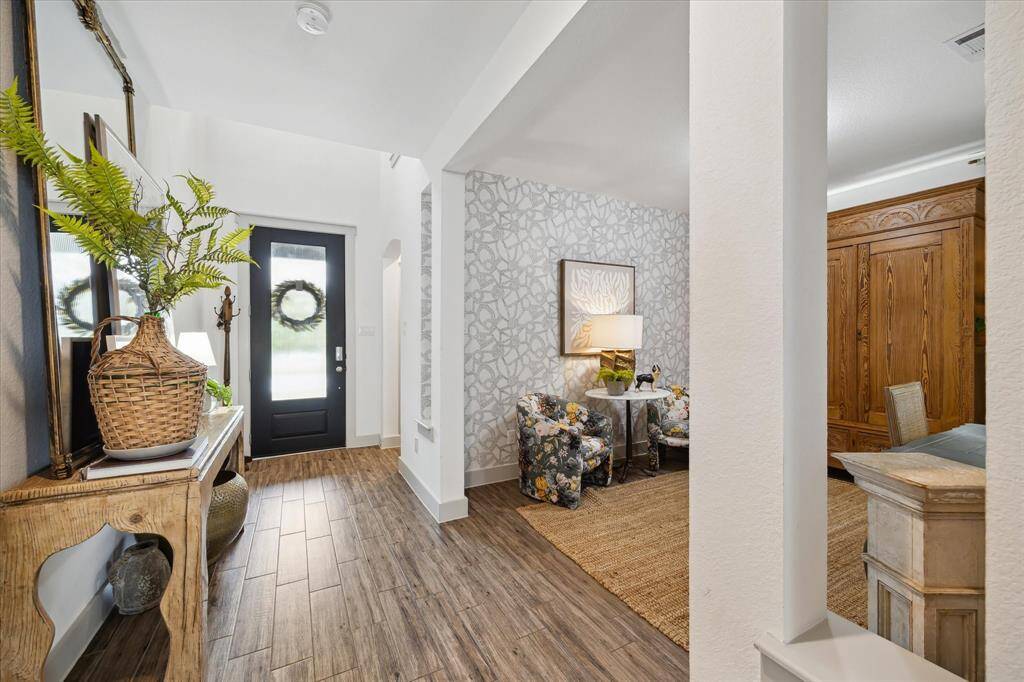 Sophisticated from the first step inside, this home blends classic charm with today's design trends. Clean lines, thoughtful details, and refined finishes bring a contemporary elegance to this traditional 2-story home.
