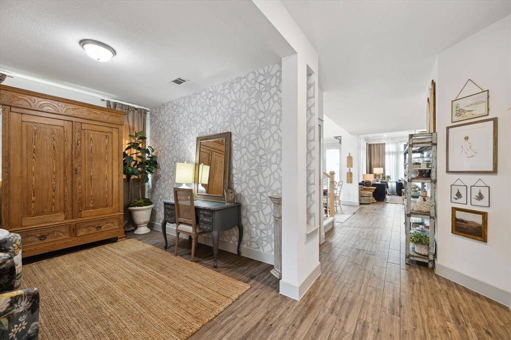 Light, bright, and beautifully styled, this home features beautiful tile floors throughout and sunlit spaces in every room.