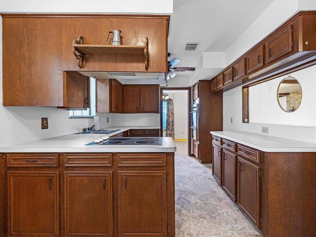 View of kitchen from eat in dining room.