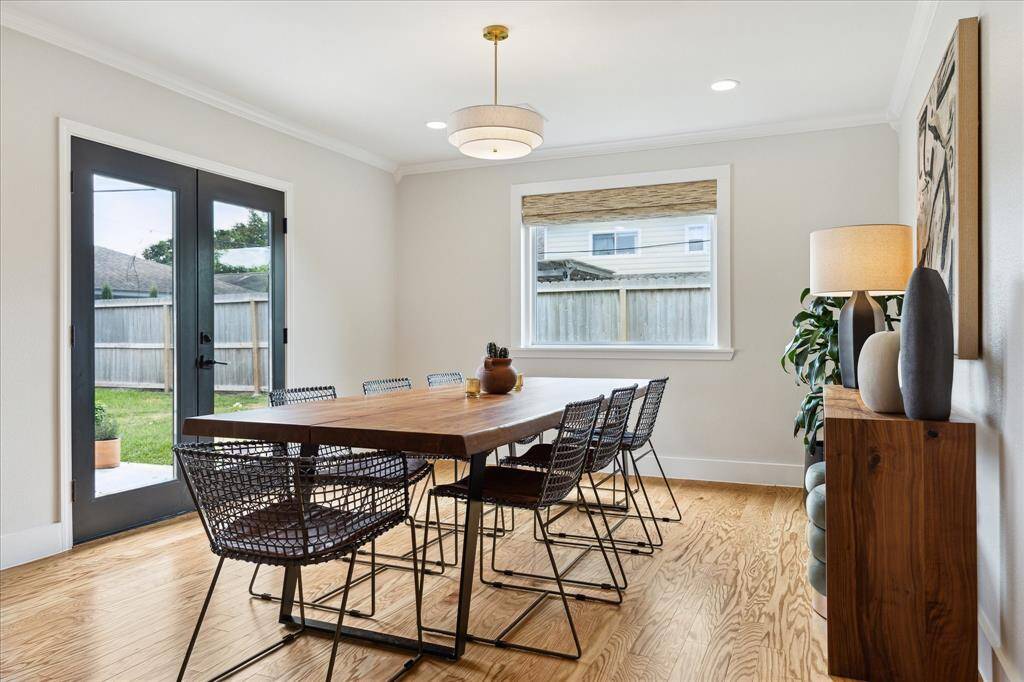 The generously sized dining area opens to the patio through double glass doors, creating ease of going in and out when grilling and entertaining!