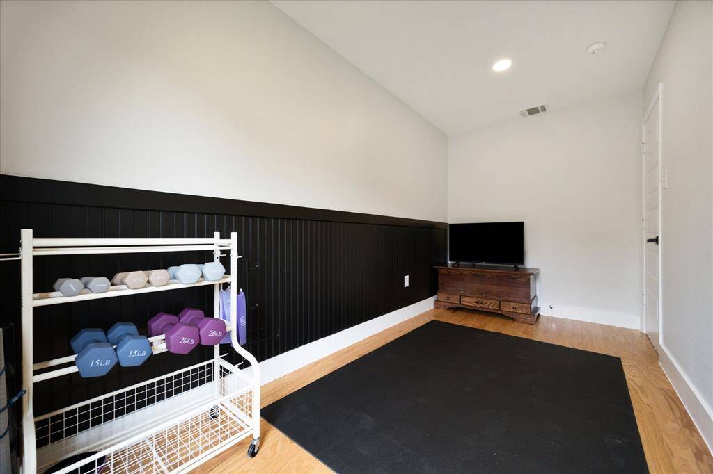 Flex Space / Home Gym (14' x 8'): Whether you need a workout area, home office, craft room, or reading nook—this versatile space is ready to adapt to your lifestyle. A painted beadboard accent wall adds character.