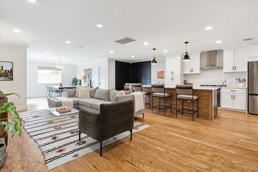 This home offers an exceptional flow, perfect for entertaining guests. Tucked into the corner, a cozy breakfast nook adds charm and comfort to the space.