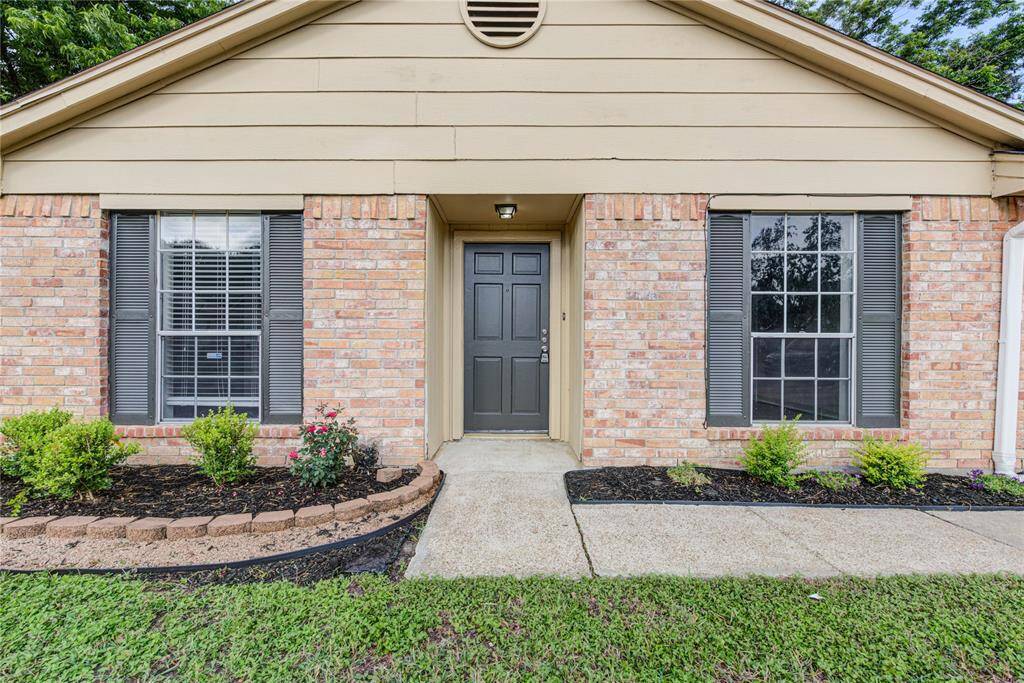 Welcome to your new home! The beautifully maintained front yard features fresh landscaping and great curb appeal. A classic brick façade and charming entryway greet you and your guests, setting a warm and inviting tone from the moment you arrive.