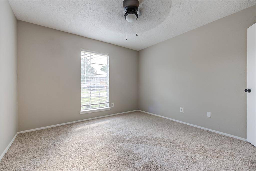 Versatile and bright, the third bedroom offers plenty of space for a guest room, kids’ room, or home office.