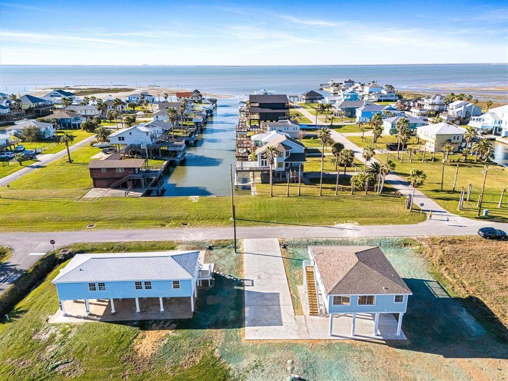 Bird's eye view featuring a residential view and a canal & bay view
