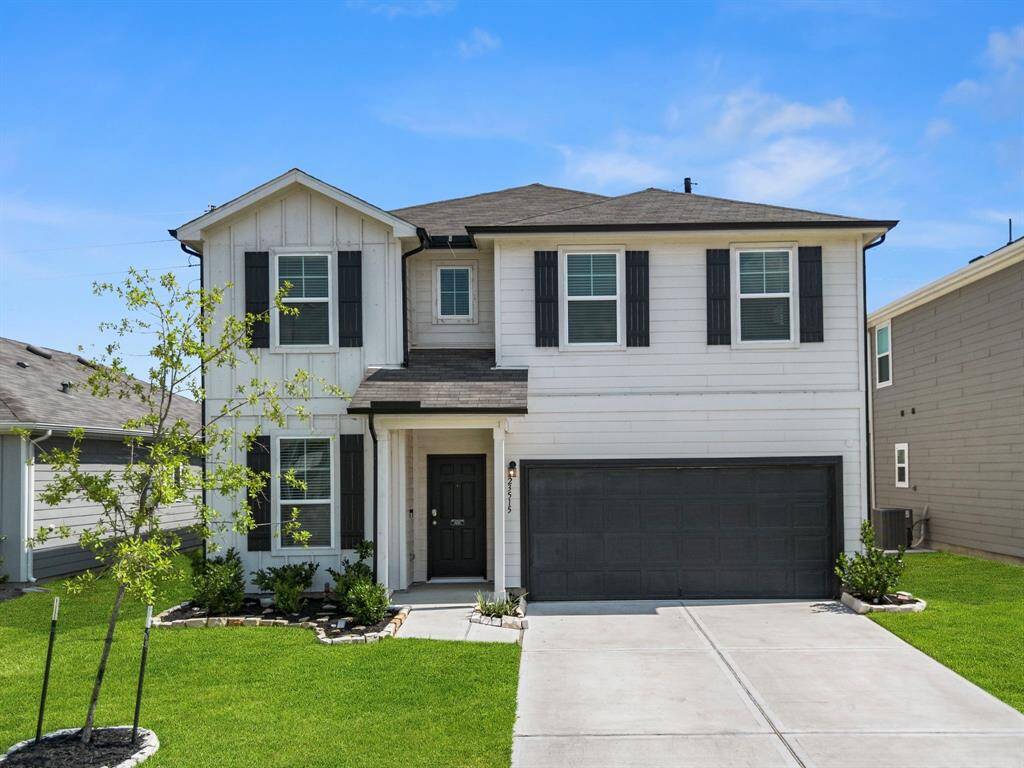 The property, a traditional-style home, features a wood siding exterior and a durable composition roof, offering a modern yet timeless appeal.