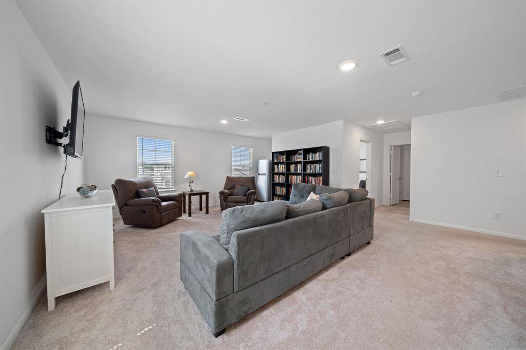 This open area is perfect for a family room, game zone, or quiet retreat.