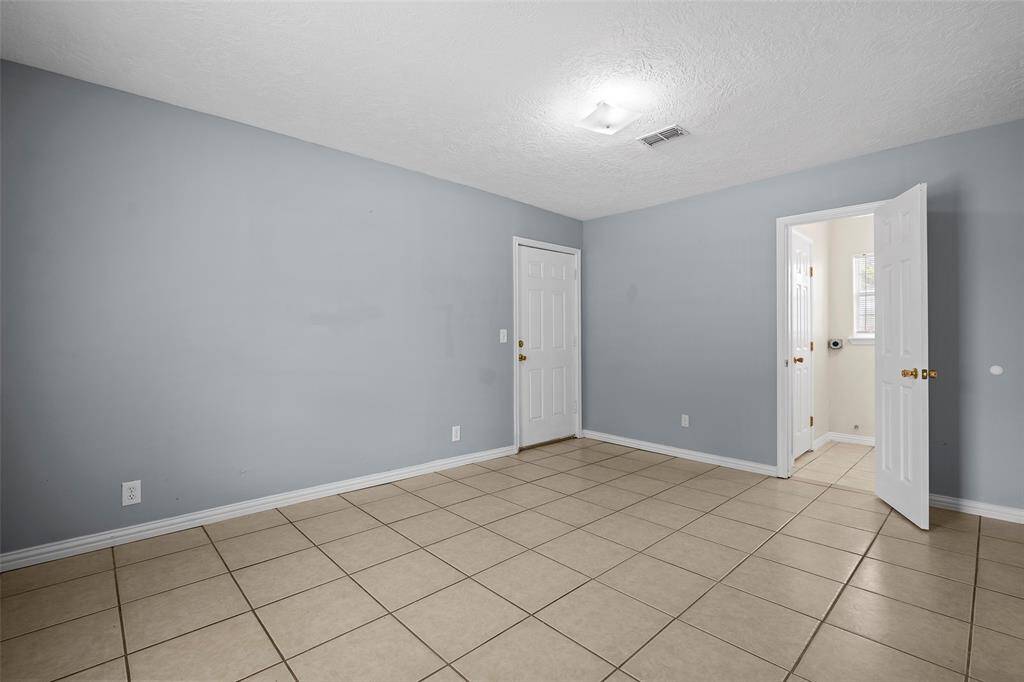 Door to backyard and laundry room.