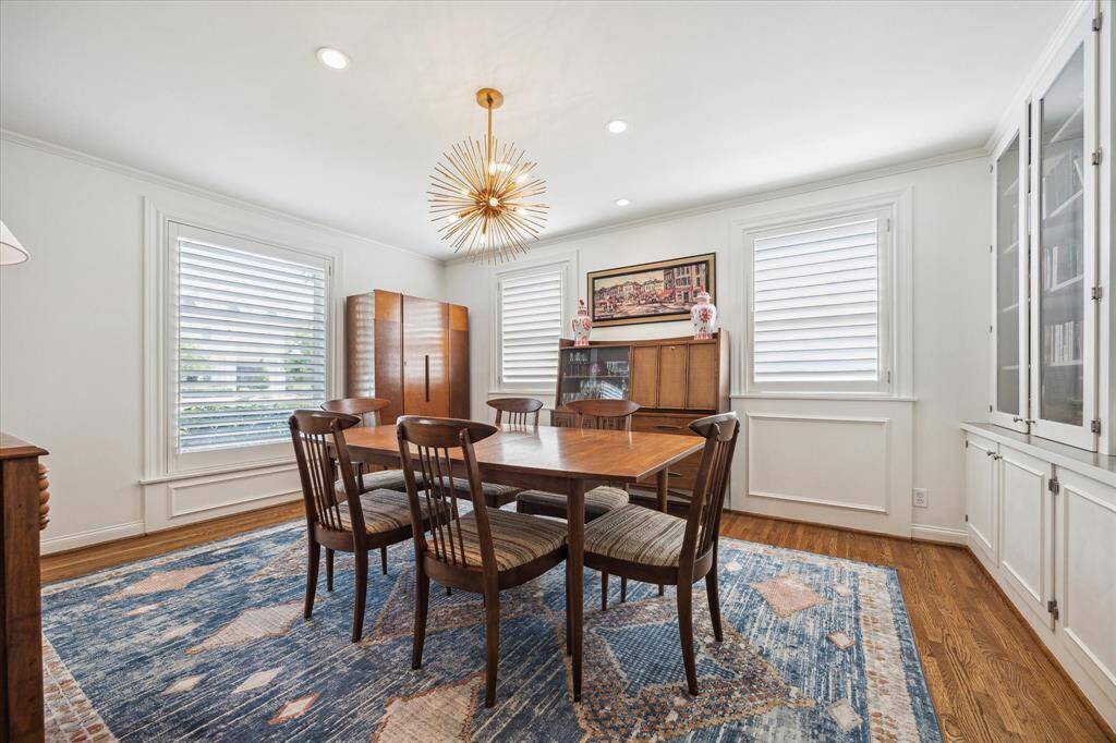 Whether you're hosting formal dinners or enjoying casual meals at the kitchen’s breakfast bar, this home adapts to every occasion.