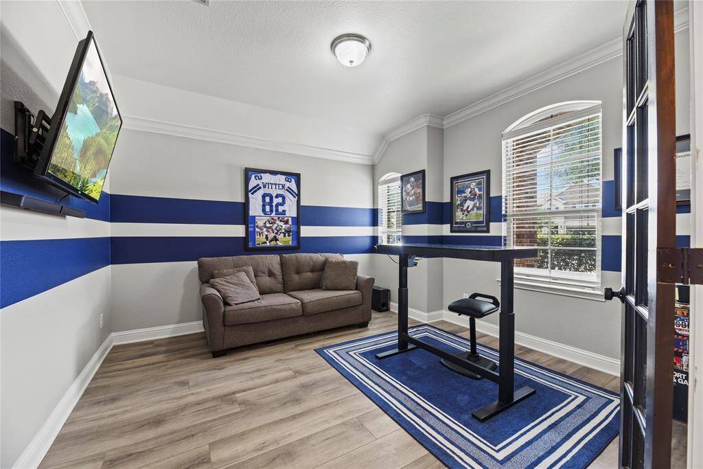A private study through double glass doors adds a touch of sophistication and privacy to the home.