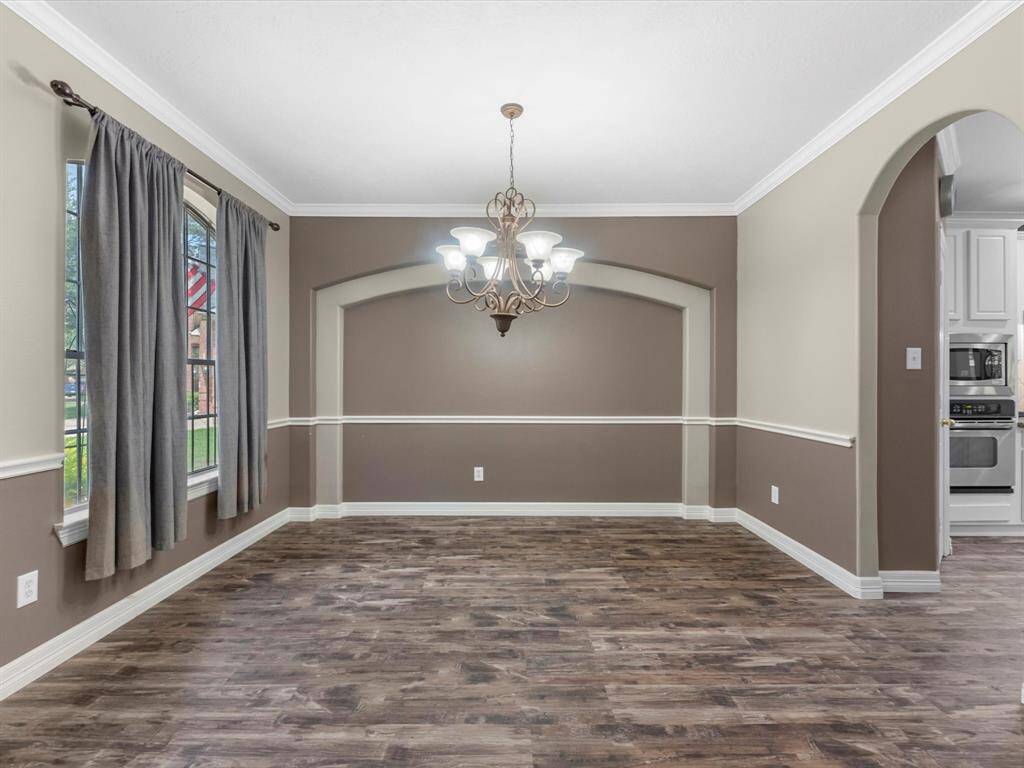 The formal dining makes a perfect home office as well