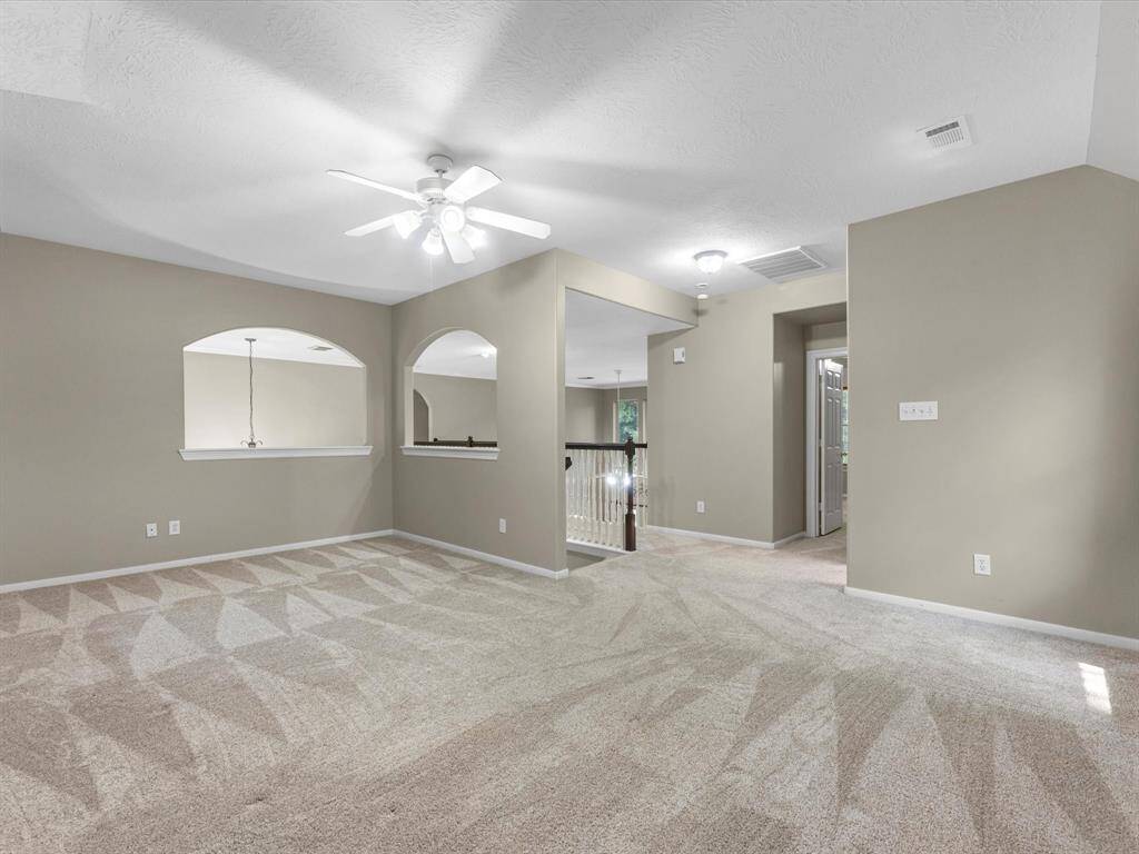 The upstairs gameroom makes a nice get away for movie watching or curling up with a good book. Or put that pool table up here!