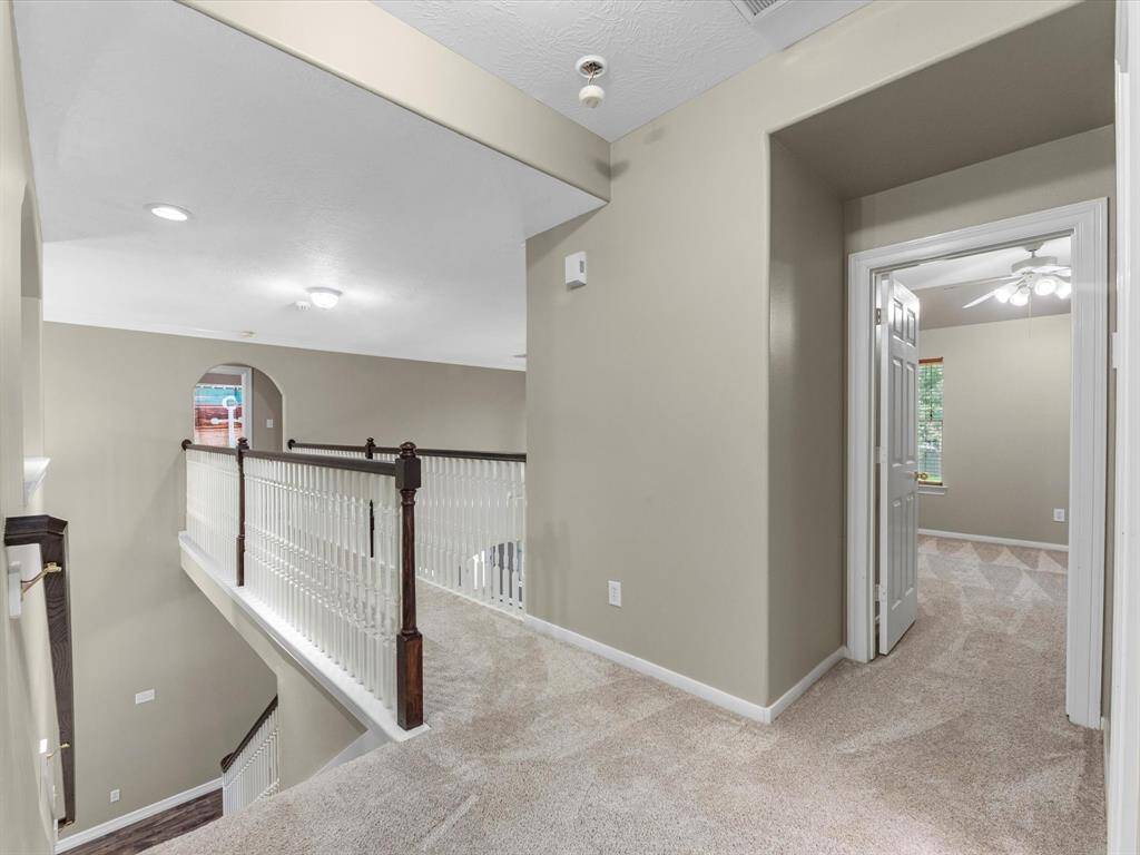 The cat walk upstairs runs between the gameroom and 1 bed/full bath and 2 more beds/1 more full bath