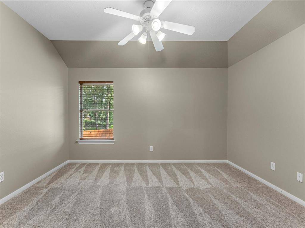 One secondary bedroom upstairs has a full bathroom