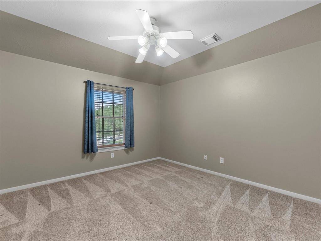 This secondary bedroom is on the other side of the catwalk