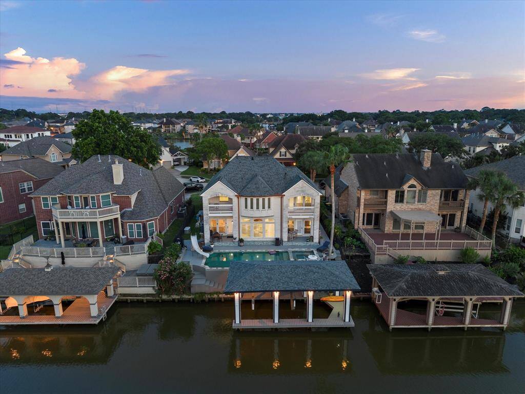 STUNNING AERIAL VIEW HIGHLIGHTS ALL THE AMENITIES YOU COULD ASK FOR ON THE WATER INCLUDING POOL, SPA AND BOATHOUSE.
