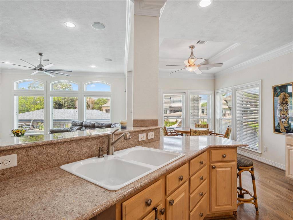 ENTERTAIN AT EASE WITH THE OPEN FLOORPLAN WITH WATER VIEWS FROM EVERY FIRST FLOOR LIVING AREA.