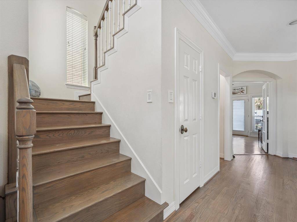 UPDATED STAIRS WITH WOOD TREAD.