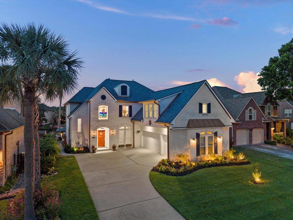 BEAUTIFUL FRONT ELEVATION FROM THIS QUIET, CUL-DE-SAC LOT.