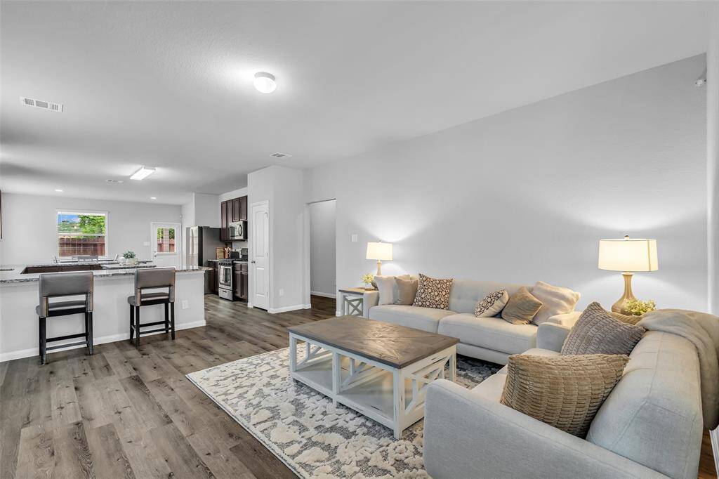Family room open to kitchen and breakfast bar