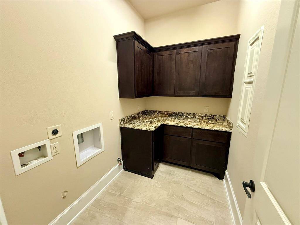 Utility room with built-ins.