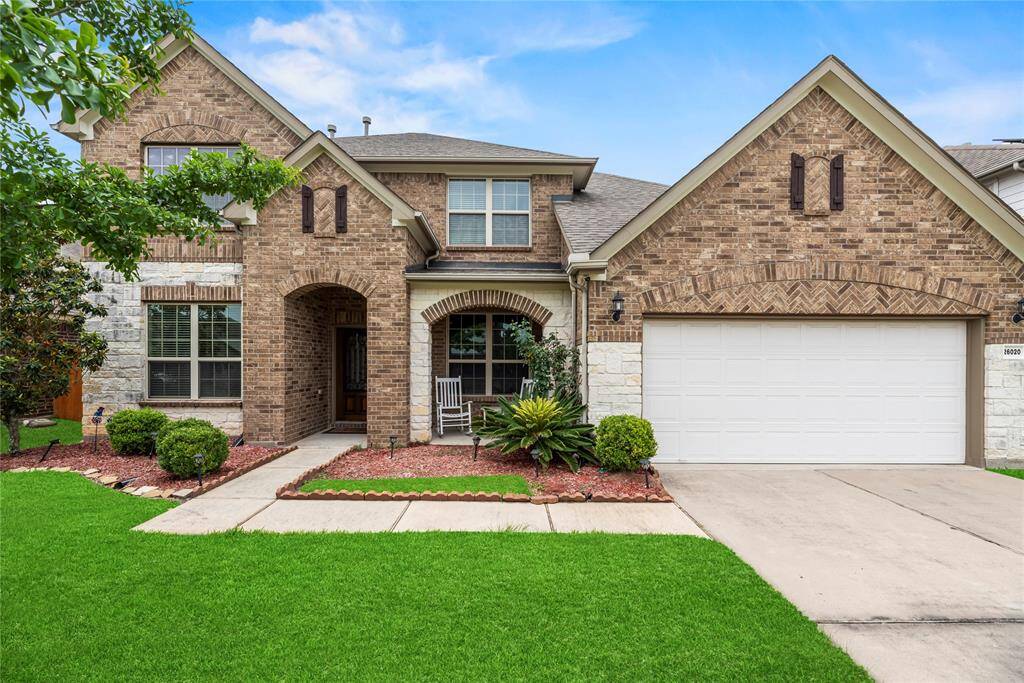 Welcome home to 26020 Bassfield Lane, nestled in the charming King Lakes community in Katy!