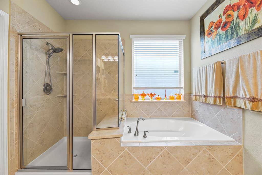 Relax in your deep soaking tub or opt for a quick rinse in the separate shower.