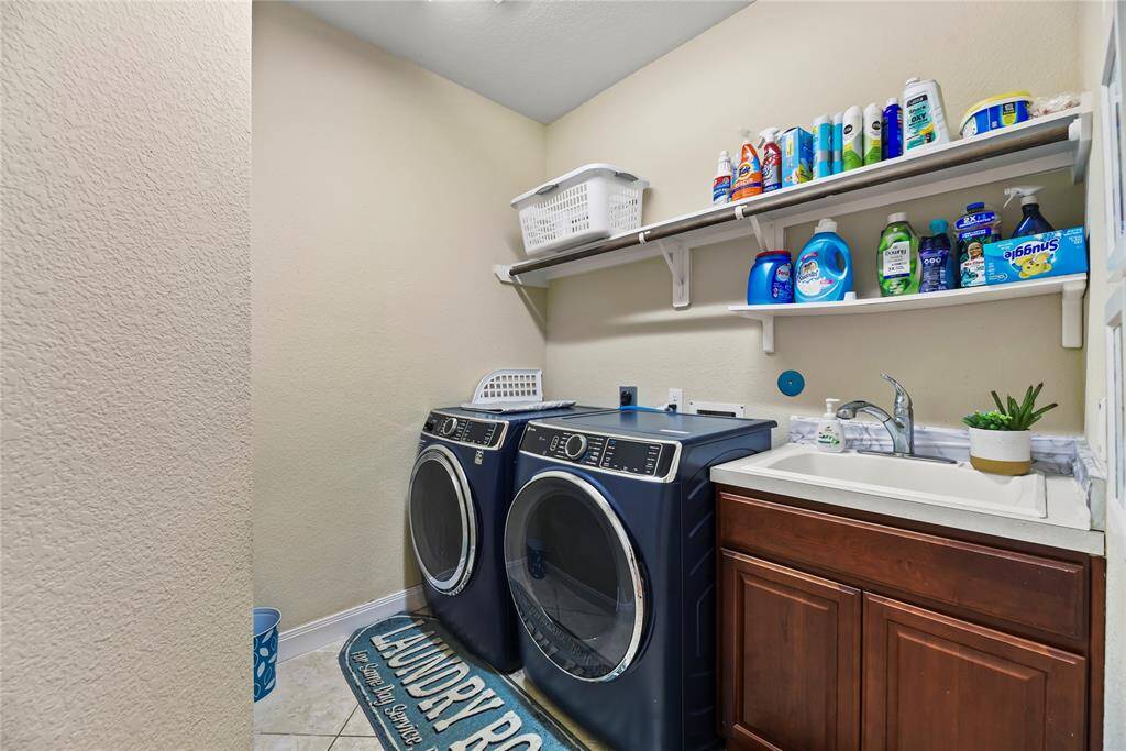 Experience convenience with the in-house utility room, thoughtfully designed with a dedicated laundry area.