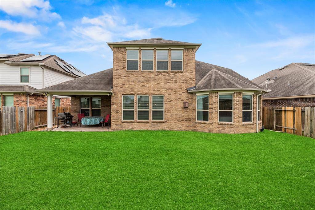 This spacious yard offers endless possibilities for creating cherished memories in the great outdoors.