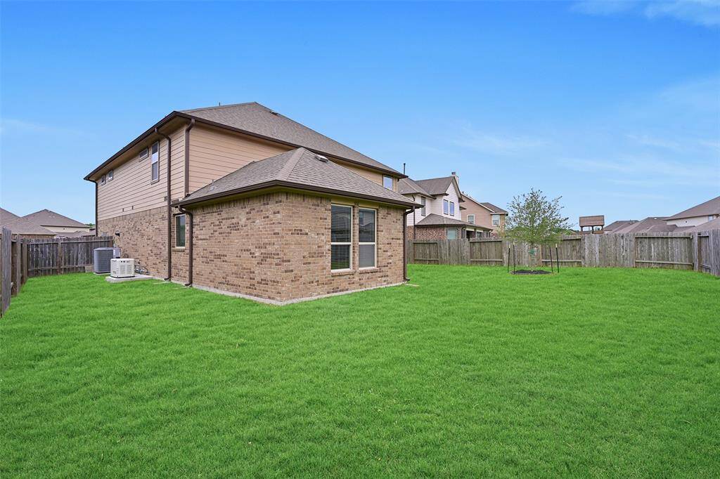 In addition to a beautiful living space & lush backyard, this home boasts energy-efficient features like double-pane windows, a tankless water heater, radiant barrier, attic vents, and a whole-home backup generator add lasting value and peace of mind.