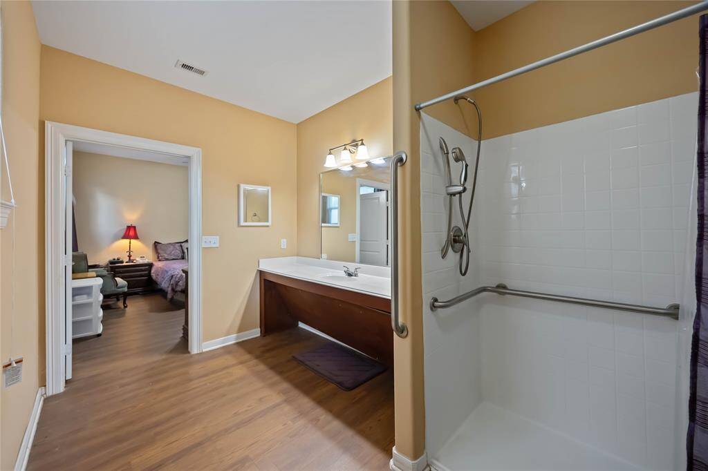 Primary bath featuring a convenient walk-in shower.