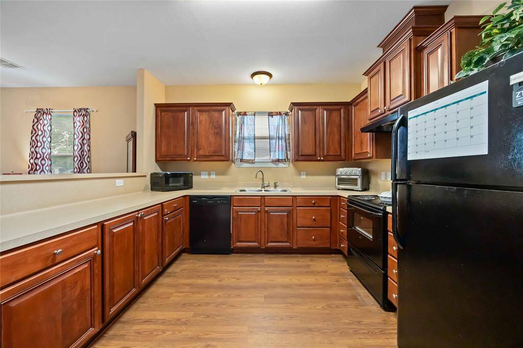 Spacious kitchen featuring ample counter space and modern appliances