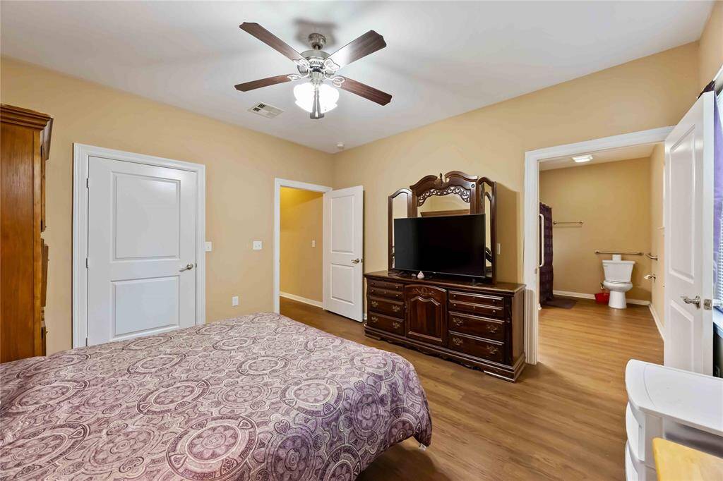 Another view of primary bedroom