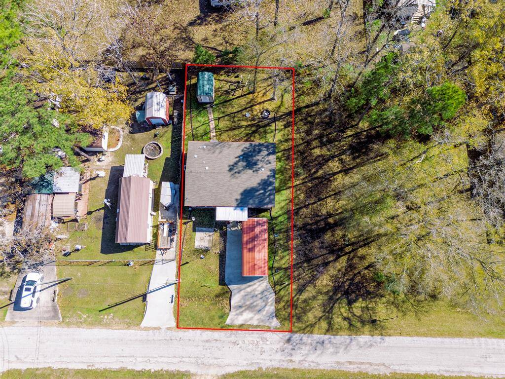 Discover your new home at 271 Saint Thomas Dr—a charming retreat with a welcoming porch, spacious carport, and surrounded by nature's beauty.