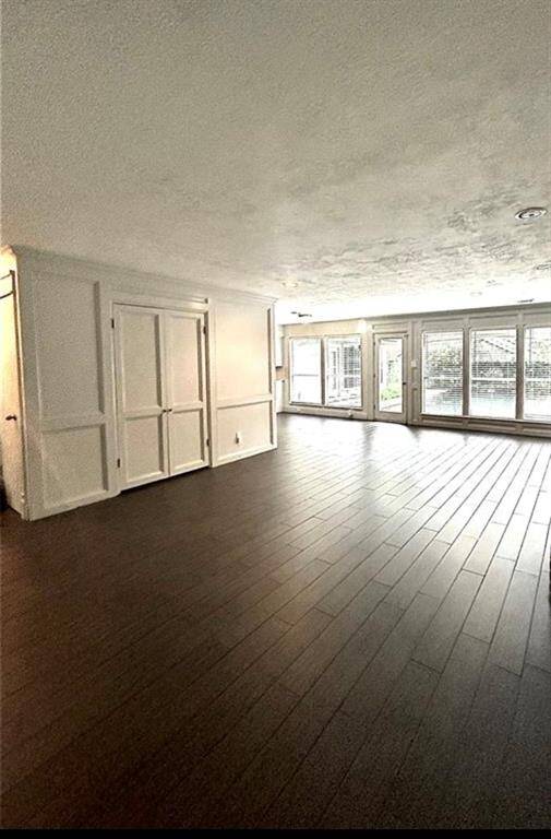 Living space with full hidden bar, sink, mini fridge & gas or wood fireplace not shown.