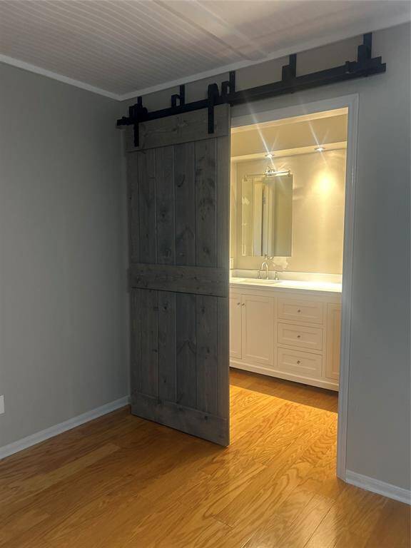 Upstairs master bath has double vanity & large walk in closet