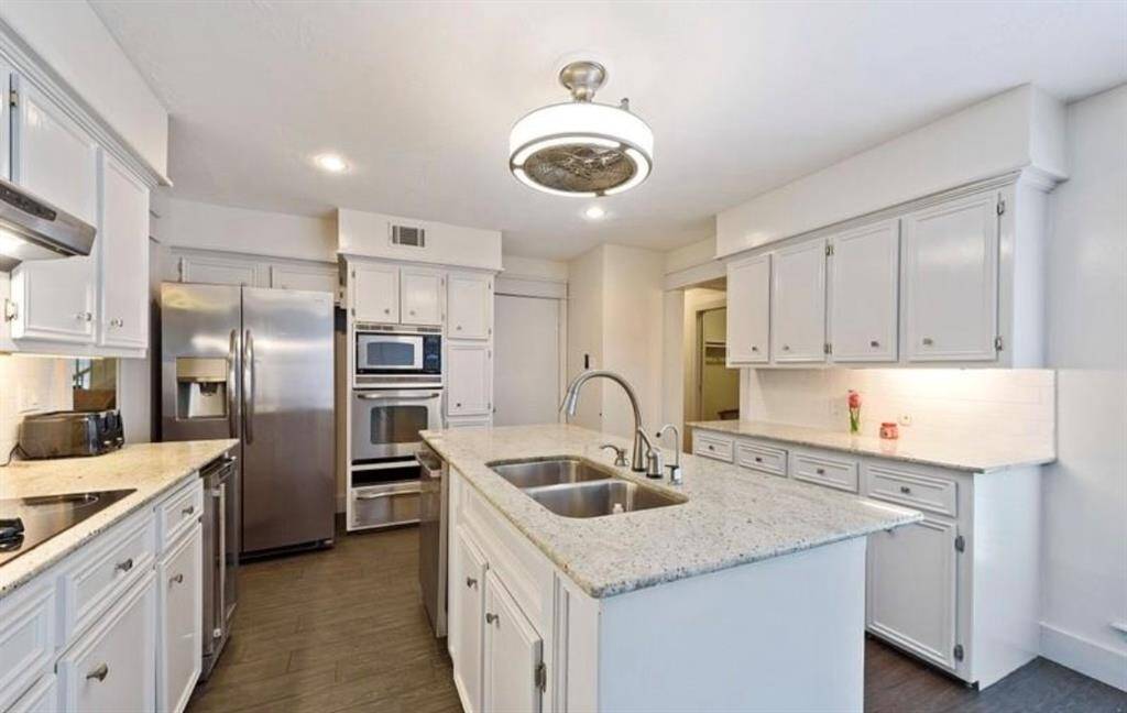 Perfect kitchen layout with pool view and open floorplan to living/dining & breakfast room