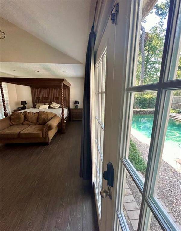 Downstairs Flex Room or secondary master - patio access & pool view