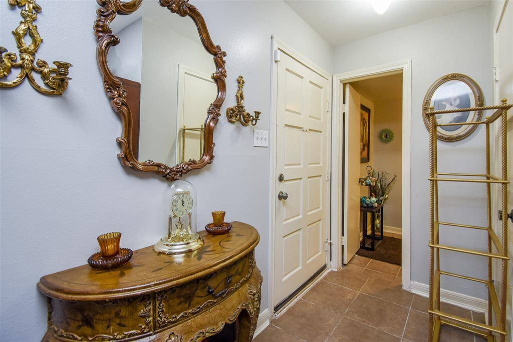 This is the inside view of the front entrance; open and roomy enough for accent pieces. The half-bath is next to it.