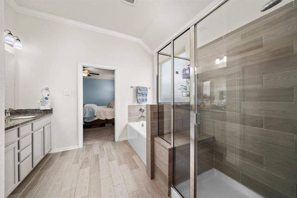 The Walk in shower is equipped with a built in bench