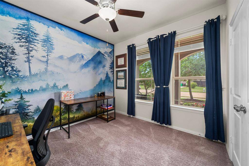 Bedroom 2 is located on the 1st floor and has a great view of the front porch. This is a great room to have on the 1st floor if you have guests or a new addition to your lovely household.