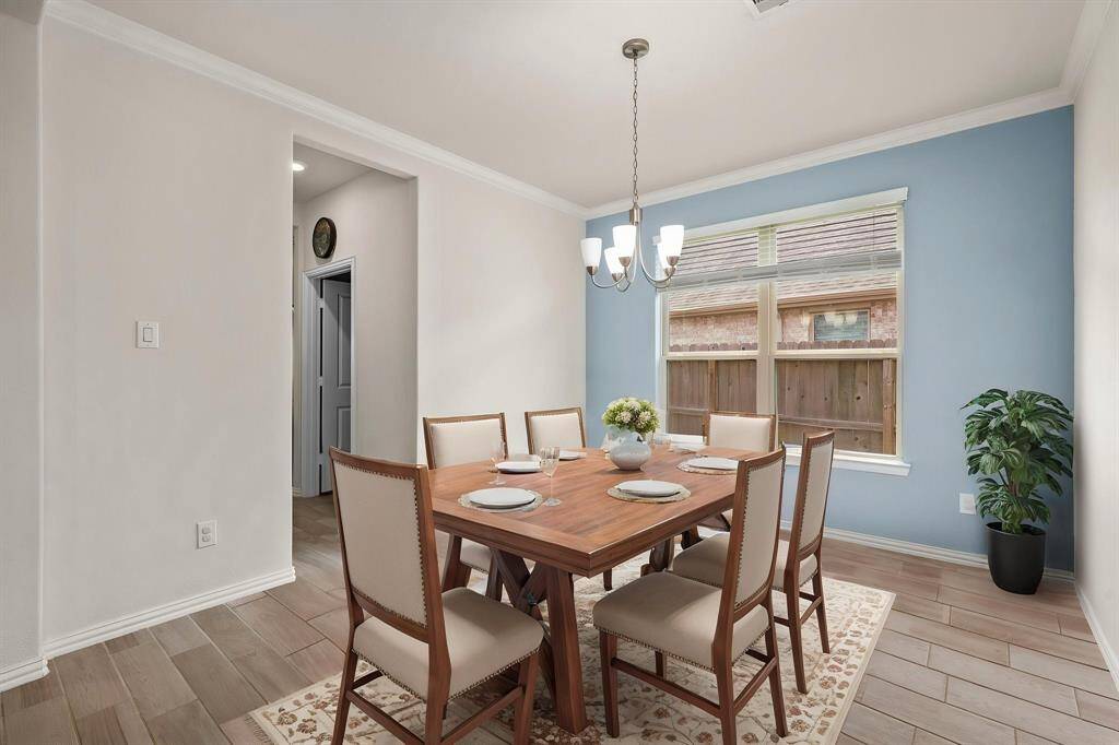 As you walk down the foyer, you will be greeted on the right by a formal dining room that can also be used as an office are or formal living room